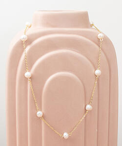 Spaced pearl necklace